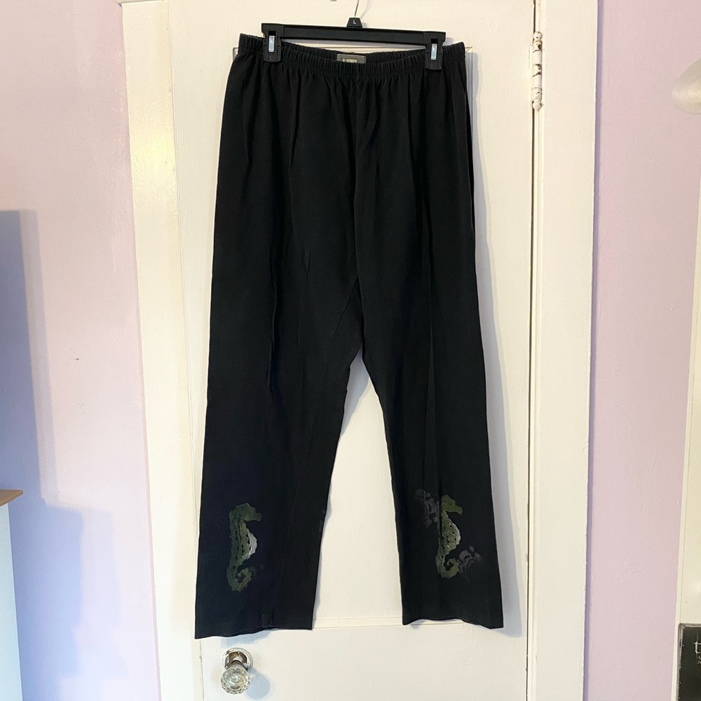 Blue fish black pants with seahorse design.